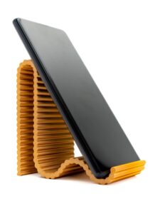 Suporte de Celular acabamento ondulado na cor dourada