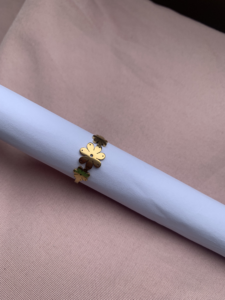 anel floral dourado